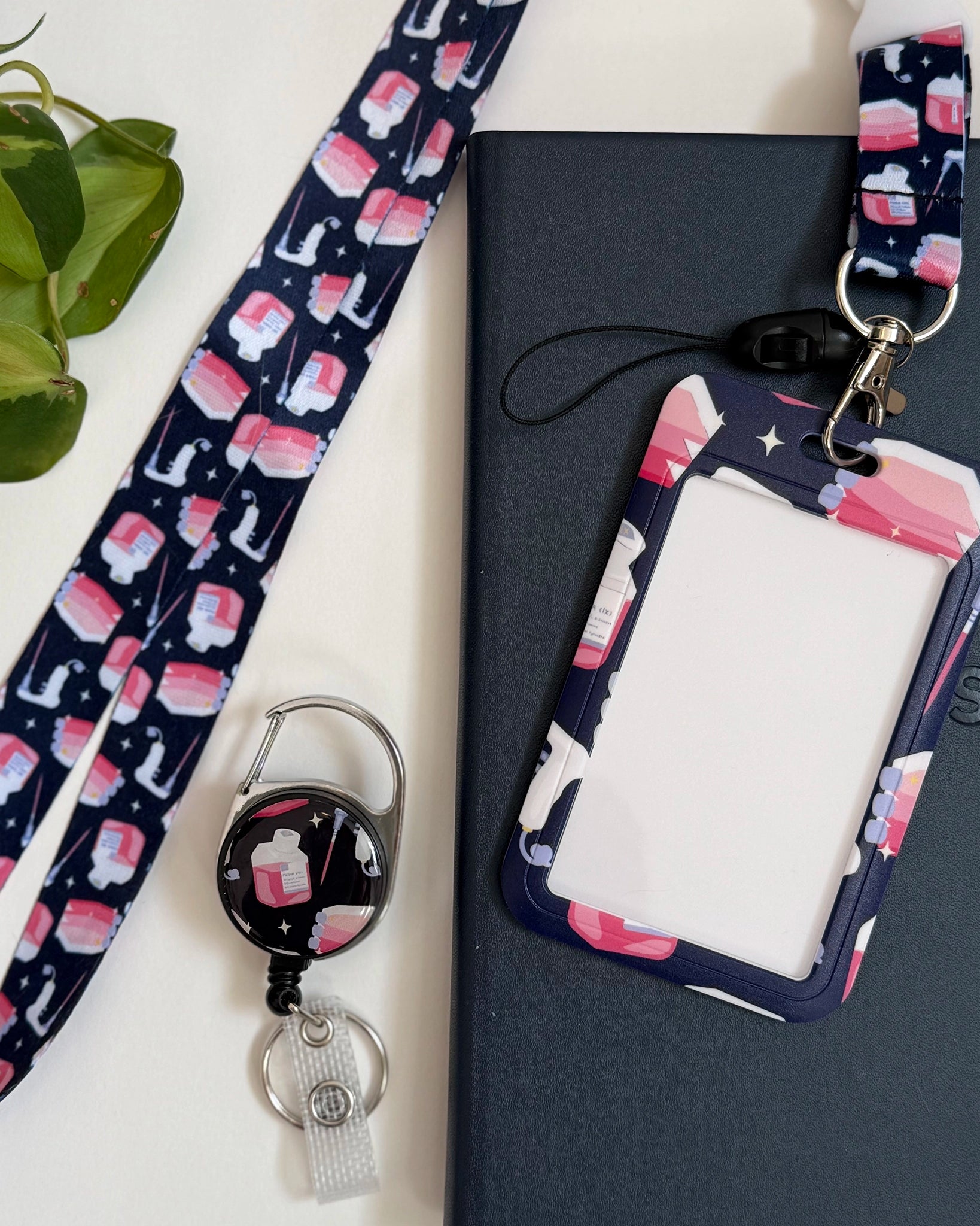 Cell culture card holder set including a lanyard, card holder, and retractable badge reel.