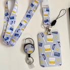 Micropipette card holder set including a lanyard, card holder, and retractable badge reel.