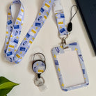 Micropipette card holder set including a lanyard, card holder, and retractable badge reel.