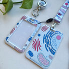 Cell Biology lanyard, badge reel, and card holder, viewed from an angle