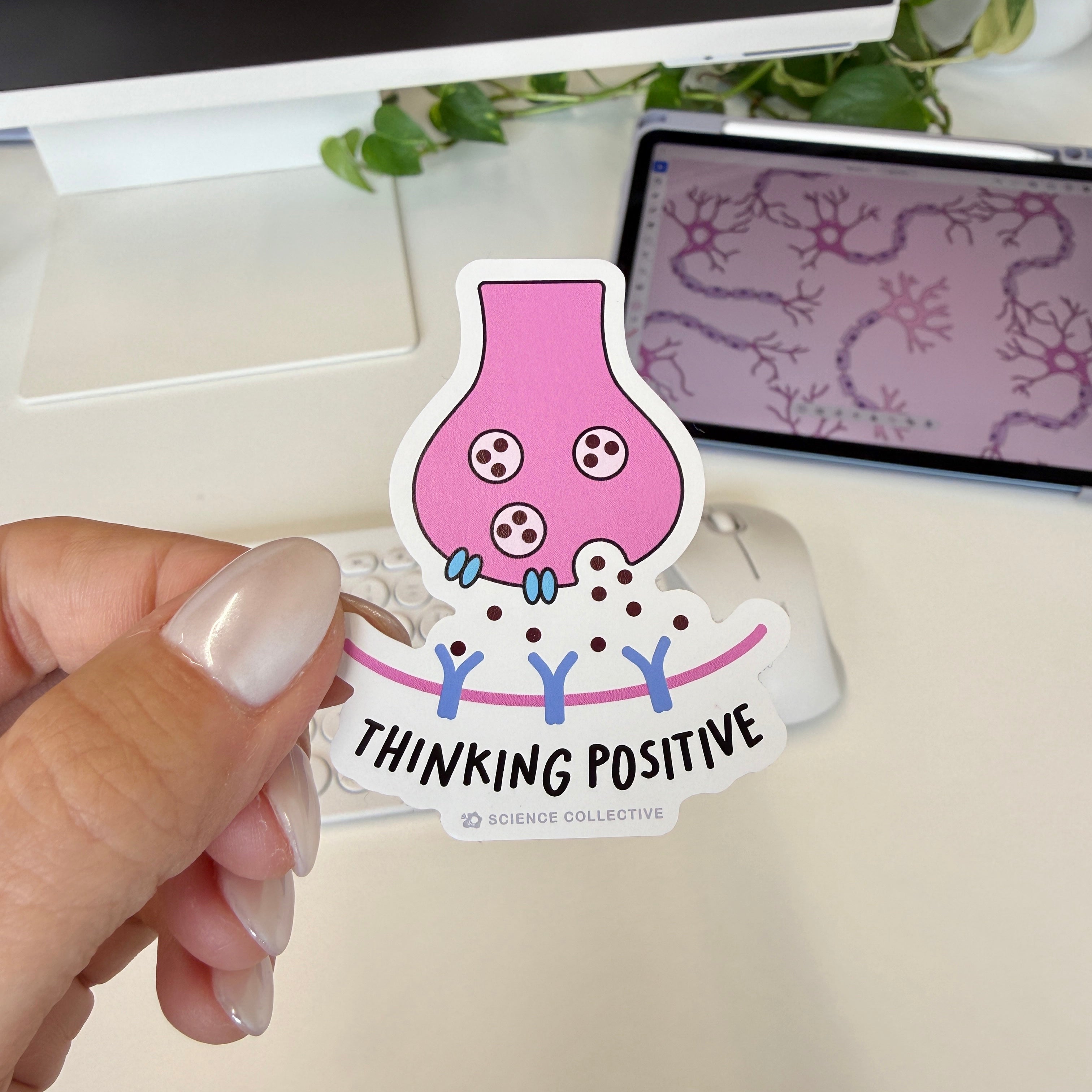 Cute neuroscience sticker from science collective featuring a neuron synapse